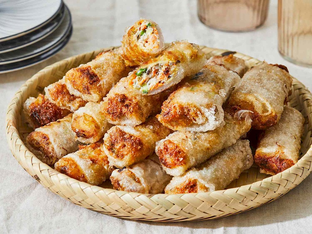 Fried vegetarian spring rolls with crispy outer layer, fragrant filling, rich in vegetable and mushroom flavor